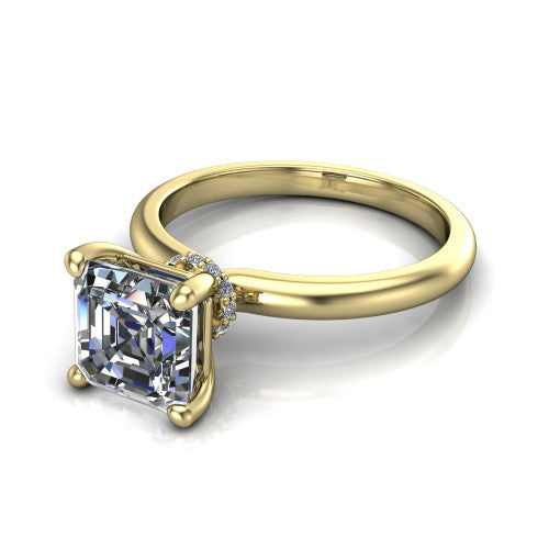 Quinn emerald solitaire engagement ring in 14K Yellow Gold with hidden halo and plain band, three-quarter perspective view