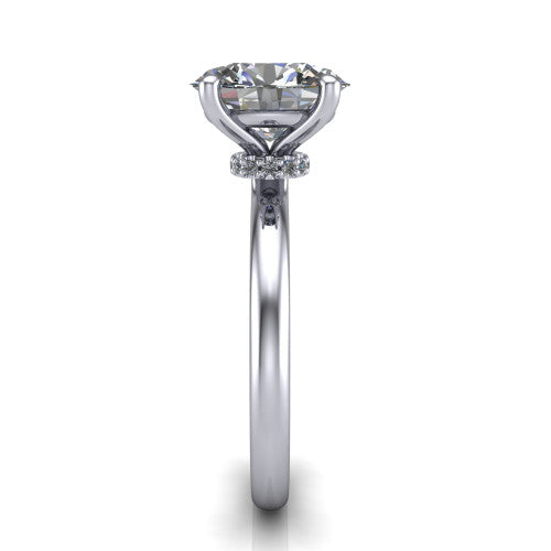 Quinn oval solitaire engagement ring in 14K White Gold with hidden halo and plain band, side profile showing the plain band and hidden halo