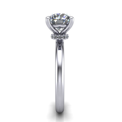 Quinn round solitaire engagement ring in Platinum with hidden halo and plain band, side profile showing the plain band and hidden halo