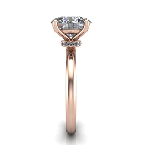 Quinn oval solitaire engagement ring in 18K Rose Gold with hidden halo and plain band, side profile showing the plain band and hidden halo