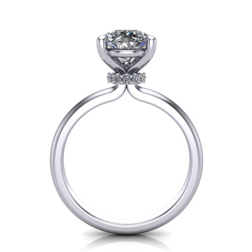 Quinn pear solitaire engagement ring in 18K White Gold with hidden halo and plain band, through-finger front profile showing the hidden halo collar