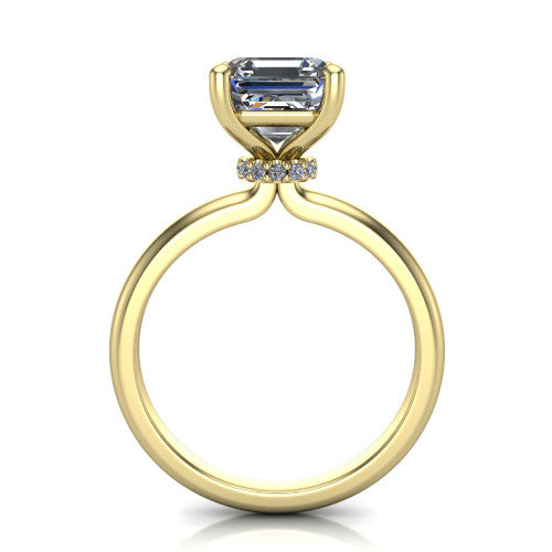 Quinn emerald solitaire engagement ring in 18K Yellow Gold with hidden halo and plain band, through-finger front profile showing the hidden halo collar