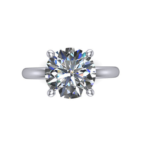 Quinn round solitaire engagement ring in 14K White Gold with hidden halo and plain band, top-down view of the four-prong center and plain band