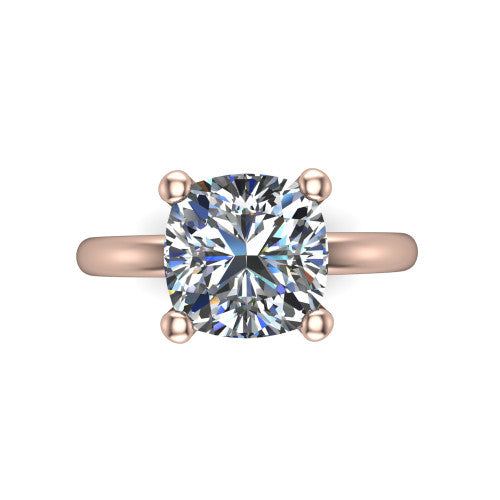 Quinn cushion solitaire engagement ring in 18K Rose Gold with hidden halo and plain band, top-down view of the four-prong center and plain band