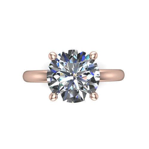 Quinn round solitaire engagement ring in 14K Rose Gold with hidden halo and plain band, top-down view of the four-prong center and plain band
