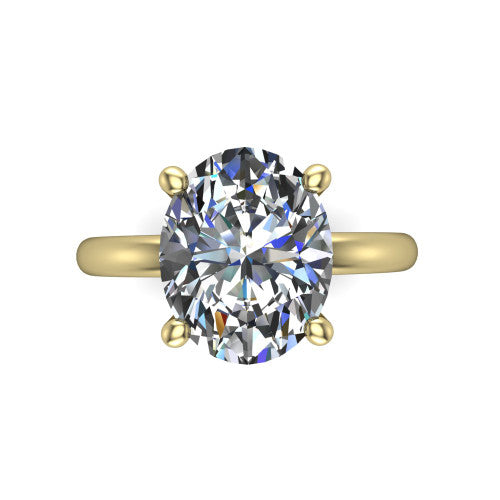Quinn oval solitaire engagement ring in 14K Yellow Gold with hidden halo and plain band, top-down view of the four-prong center and plain band