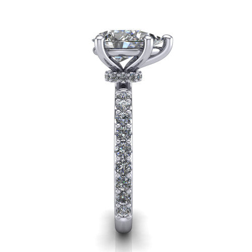 Clara pear pavé engagement ring in Platinum with hidden halo and micro-pavé band, side profile showing the hidden halo and pavé band