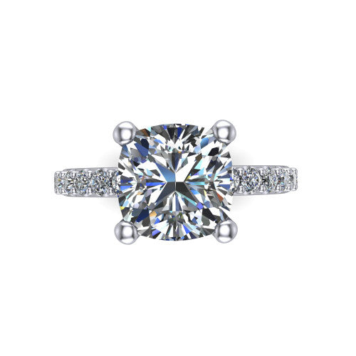 Clara cushion pavé engagement ring in Platinum with hidden halo and micro-pavé band, top-down view of the four-prong center and pavé band