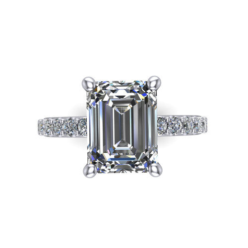 Clara emerald pavé engagement ring in 18K White Gold with hidden halo and micro-pavé band, top-down view of the four-prong center and pavé band