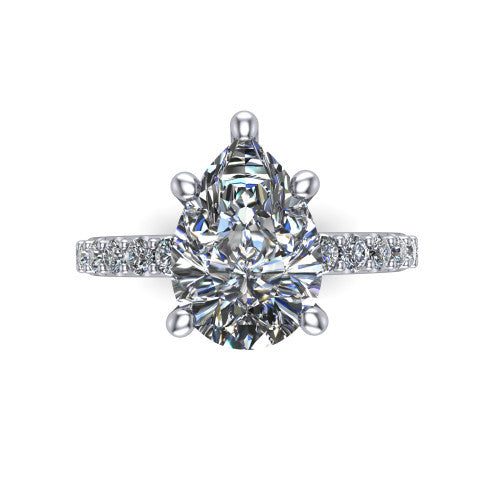 Clara pear pavé engagement ring in 14K White Gold with hidden halo and micro-pavé band, top-down view of the four-prong center and pavé band