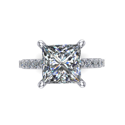 Clara princess pavé engagement ring in Platinum with hidden halo and micro-pavé band, top-down view of the four-prong center and pavé band