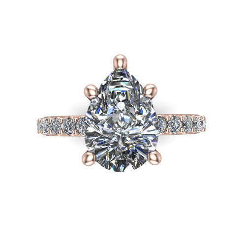 Clara pear pavé engagement ring in 18K Rose Gold with hidden halo and micro-pavé band, top-down view of the four-prong center and pavé band