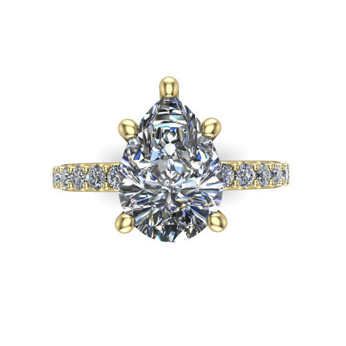 Clara pear pavé engagement ring in 18K Yellow Gold with hidden halo and micro-pavé band, top-down view of the four-prong center and pavé band
