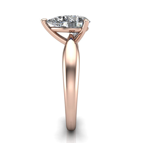 Natalie pear solitaire engagement ring in 14K Rose Gold on a tapered plain band, side profile showing the tapered plain band and bypass gallery