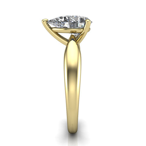 Natalie pear solitaire engagement ring in 18K Yellow Gold on a tapered plain band, side profile showing the tapered plain band and bypass gallery