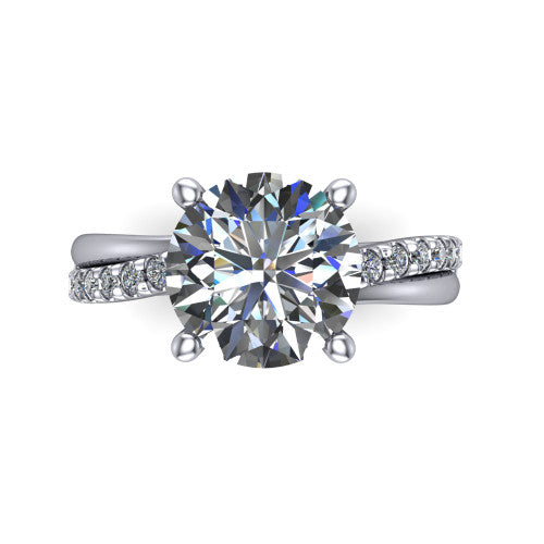 Everly round solitaire engagement ring in Platinum with micro-pavé band, top-down view of the four-prong head and pavé band