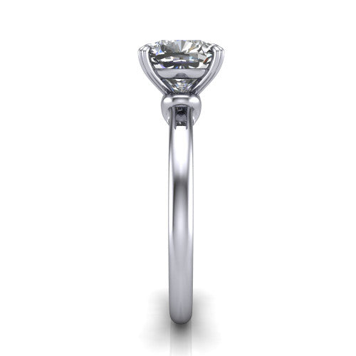 Leilani cushion solitaire engagement ring in Platinum with double-prong head on a plain band, side profile showing the plain band and sculpted knot gallery