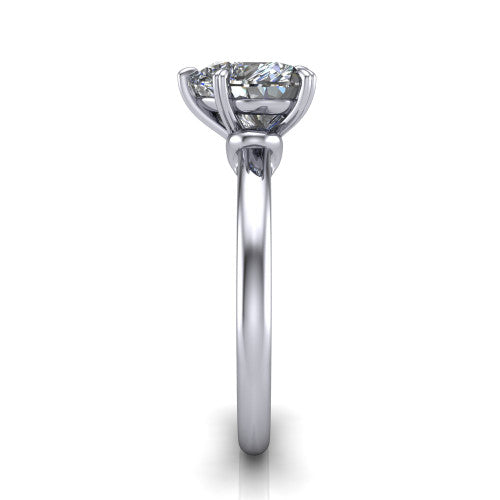 Leilani heart solitaire engagement ring in Platinum with double-prong head on a plain band, side profile showing the plain band and sculpted knot gallery