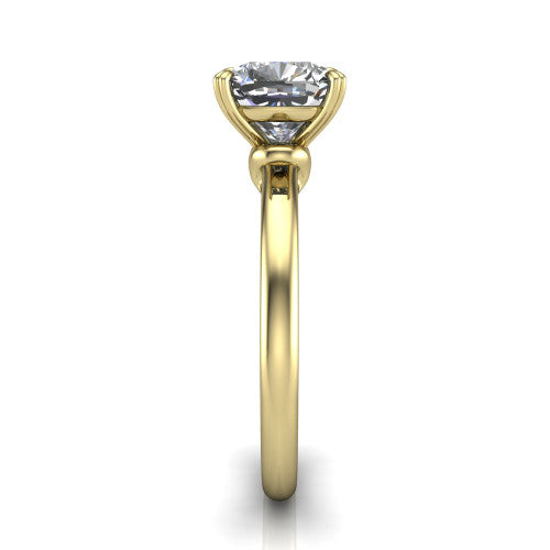 Leilani cushion solitaire engagement ring in 14K Yellow Gold with double-prong head on a plain band, side profile showing the plain band and sculpted knot gallery