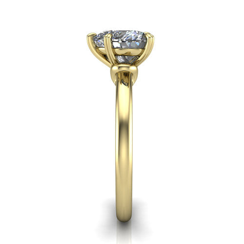 Leilani heart solitaire engagement ring in 14K Yellow Gold with double-prong head on a plain band, side profile showing the plain band and sculpted knot gallery