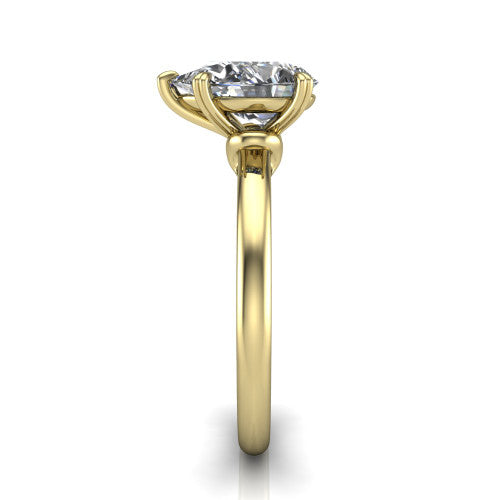 Leilani pear solitaire engagement ring in 14K Yellow Gold with double-prong head on a plain band, side profile showing the plain band and sculpted knot gallery