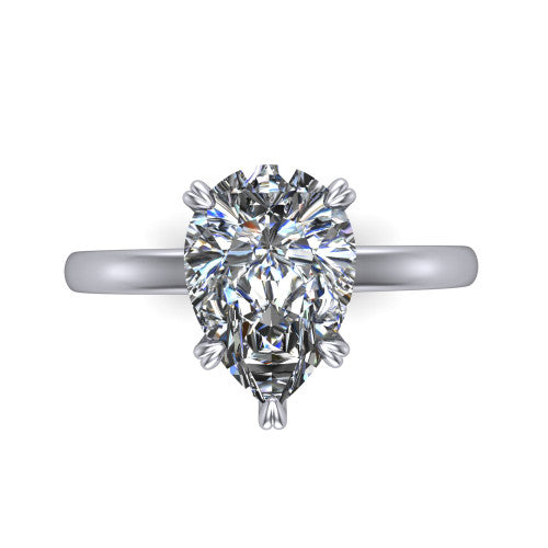 Leilani pear solitaire engagement ring in Platinum with double-prong head on a plain band, top-down view of the double-prong head on a plain band