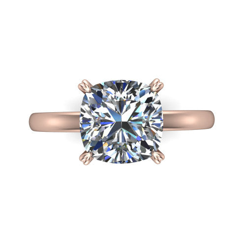 Leilani cushion solitaire engagement ring in 14K Rose Gold with double-prong head on a plain band, top-down view of the double-prong head on a plain band