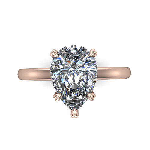 Leilani pear solitaire engagement ring in 18K Rose Gold with double-prong head on a plain band, top-down view of the double-prong head on a plain band