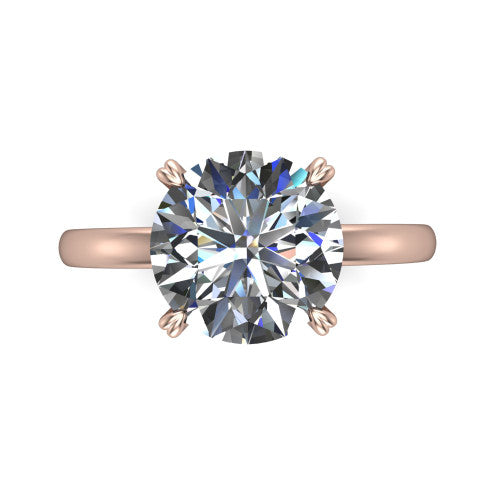 Leilani round solitaire engagement ring in 18K Rose Gold with double-prong head on a plain band, top-down view of the double-prong head on a plain band