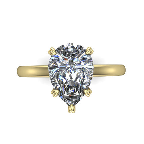 Leilani pear solitaire engagement ring in 18K Yellow Gold with double-prong head on a plain band, top-down view of the double-prong head on a plain band