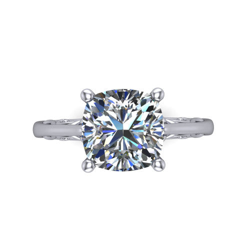 Genesis cushion vintage solitaire engagement ring in Platinum with filigree scrollwork band, top-down view of the four-prong center and filigree shoulders