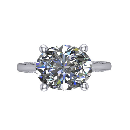Genesis oval vintage solitaire engagement ring in Platinum with filigree scrollwork band, top-down view of the four-prong center and filigree shoulders