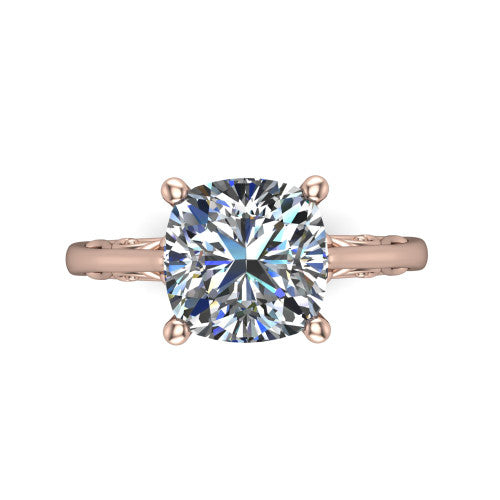 Genesis cushion vintage solitaire engagement ring in 14K Rose Gold with filigree scrollwork band, top-down view of the four-prong center and filigree shoulders