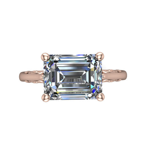 Genesis emerald vintage solitaire engagement ring in 14K Rose Gold with filigree scrollwork band, top-down view of the four-prong center and filigree shoulders