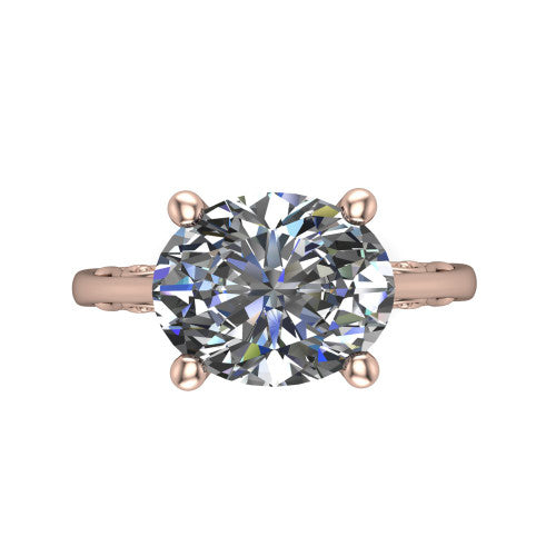 Genesis oval vintage solitaire engagement ring in 18K Rose Gold with filigree scrollwork band, top-down view of the four-prong center and filigree shoulders
