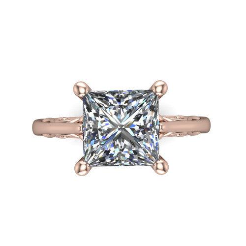 Genesis princess vintage solitaire engagement ring in 14K Rose Gold with filigree scrollwork band, top-down view of the four-prong center and filigree shoulders