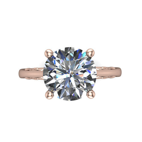 Genesis round vintage solitaire engagement ring in 18K Rose Gold with filigree scrollwork band, top-down view of the four-prong center and filigree shoulders