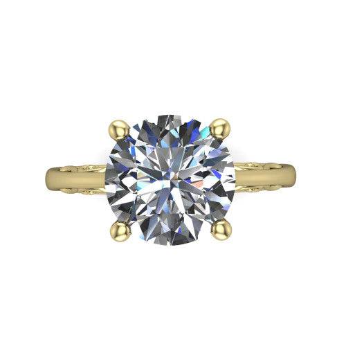 Genesis round vintage solitaire engagement ring in 18K Yellow Gold with filigree scrollwork band, top-down view of the four-prong center and filigree shoulders