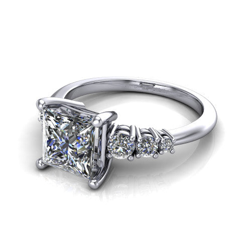 Emery princess accent engagement ring in 18K White Gold with graduated round side stones, three-quarter perspective view