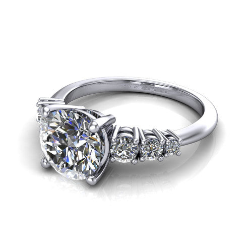 Emery round accent engagement ring in 14K White Gold with graduated round side stones, three-quarter perspective view
