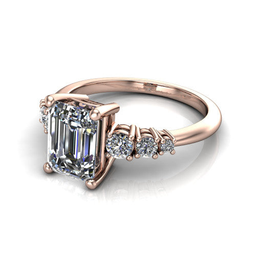 Emery emerald accent engagement ring in 14K Rose Gold with graduated round side stones, three-quarter perspective view
