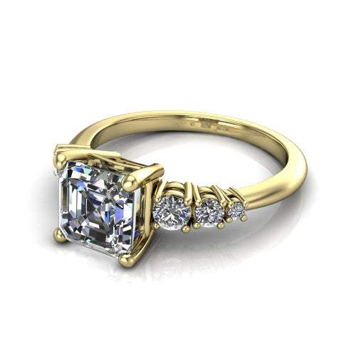 Emery asscher accent engagement ring in 14K Yellow Gold with graduated round side stones, three-quarter perspective view