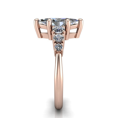Emery marquise accent engagement ring in 18K Rose Gold with graduated round side stones, side profile showing the graduated side stones and plain band