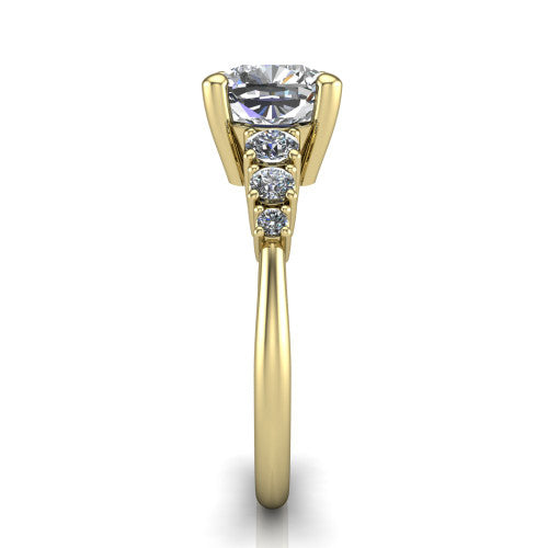 Emery cushion accent engagement ring in 14K Yellow Gold with graduated round side stones, side profile showing the graduated side stones and plain band