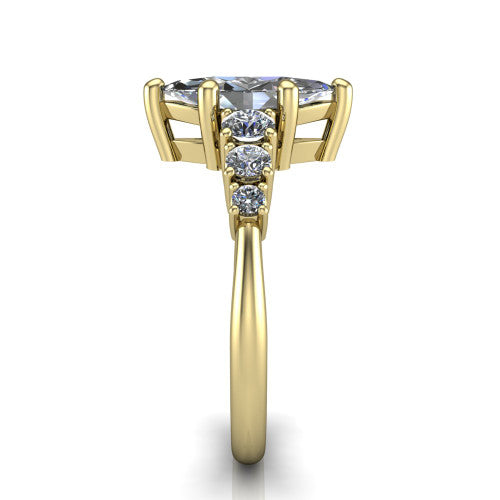 Emery marquise accent engagement ring in 18K Yellow Gold with graduated round side stones, side profile showing the graduated side stones and plain band