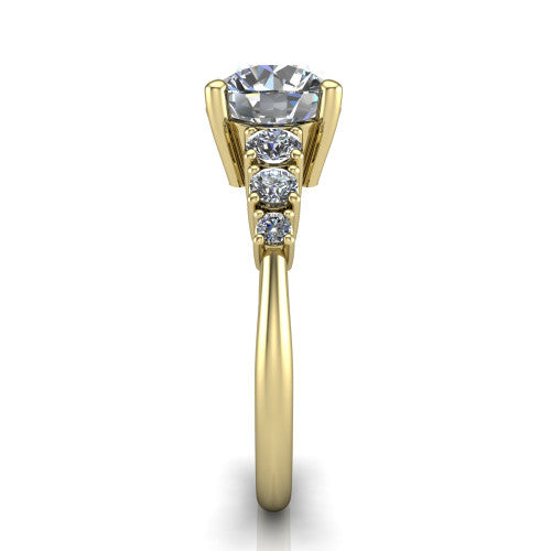 Emery round accent engagement ring in 14K Yellow Gold with graduated round side stones, side profile showing the graduated side stones and plain band