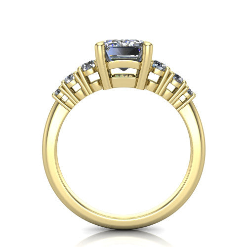 Emery emerald accent engagement ring in 14K Yellow Gold with graduated round side stones, through-finger front profile
