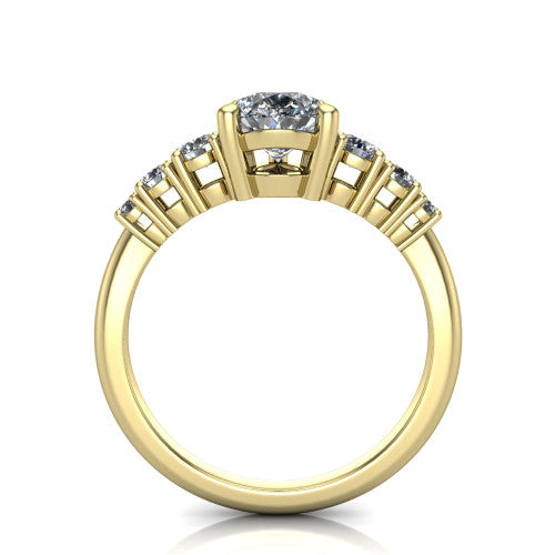 Emery pear accent engagement ring in 14K Yellow Gold with graduated round side stones, through-finger front profile