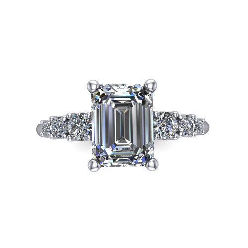 Emery emerald accent engagement ring in 18K White Gold with graduated round side stones, top-down view of the center and graduated round side accents