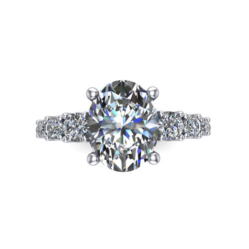 Emery oval accent engagement ring in 18K White Gold with graduated round side stones, top-down view of the center and graduated round side accents